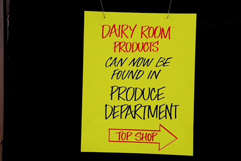 Sign indicating new (final) location of Dairy Room merch.