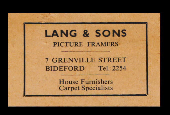 Sticker advertising Lang and sons (picture framers), of Grenville street.